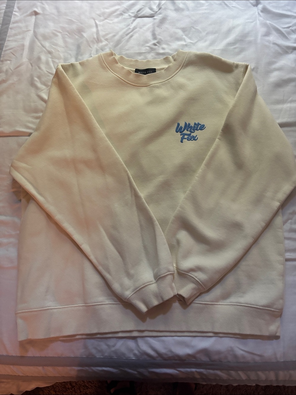 White Fox Boutique Cream Crewneck Sweatshirt with Blue Logo